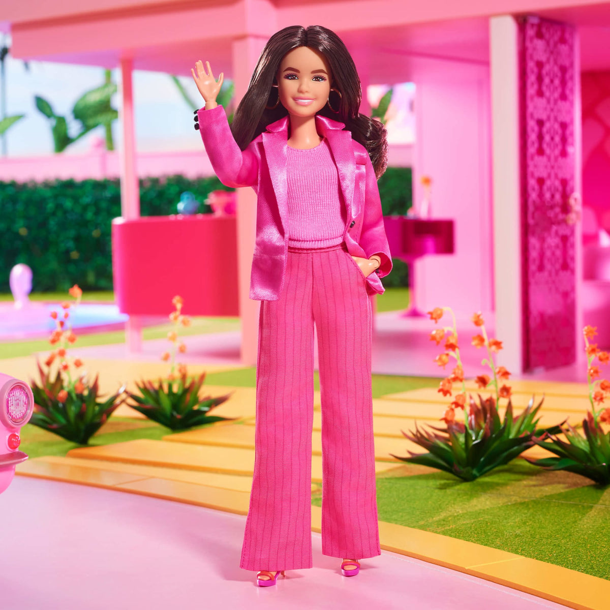 Gloria Doll Wearing Pink Power Pantsuit – Barbie The Movie